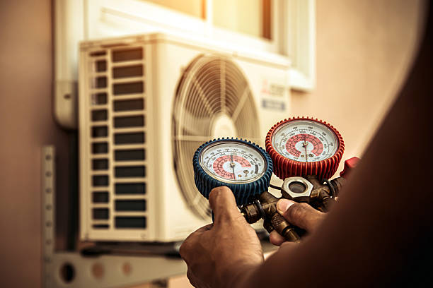 Professional Hvac technician working in Harvard, MA